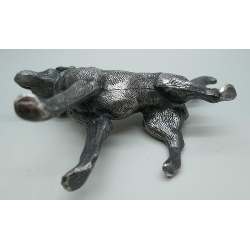 2166 - A spelter pounce pot in the form of a dog