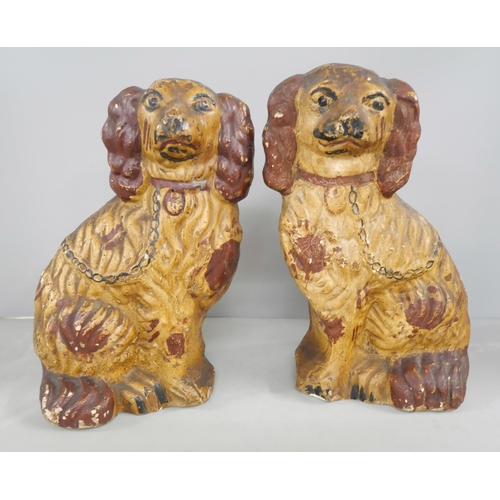 2195 - A Staffordshire model of a lion and a pair of 19th century plaster Staffordshire style spaniel figur... 