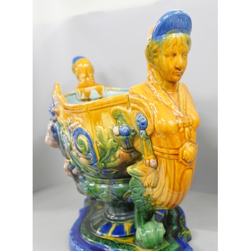 2209 - A large Majolica centrepiece bowl, a/f, one head broken off and restored, 45cm wide**PLEASE NOTE THI... 