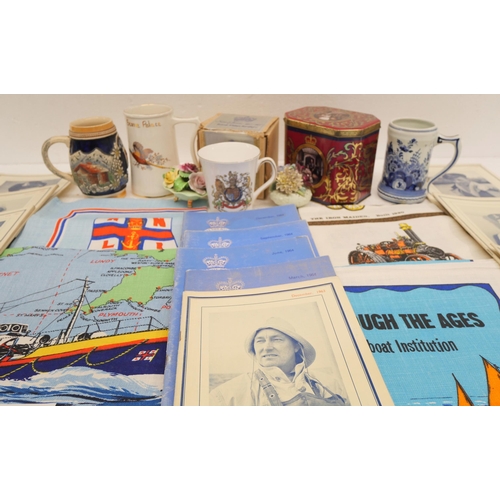 2257 - A collection of 1960s RNLI The Life Boat Publication, RNLI postcards, tea towels, china including a ... 