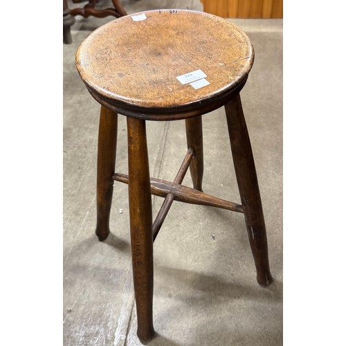 229 - A Victorian elm and beech kitchen stool