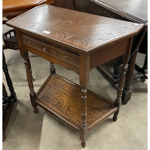 268 - An Edward VII mahogany octagonal centre table, a carved oak gateleg table, an oak hall table and a n... 