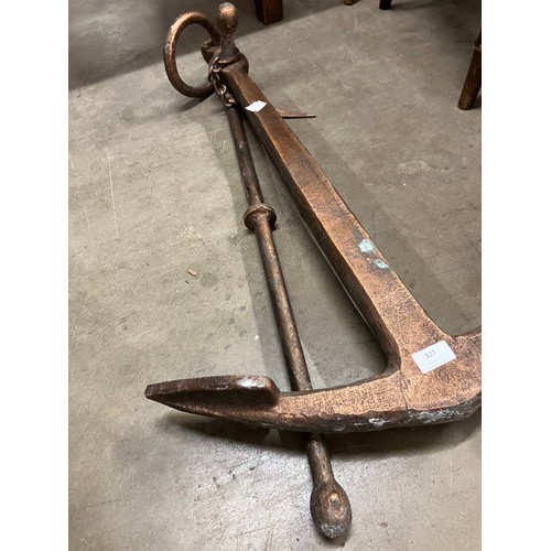 327 - A cast iron anchor