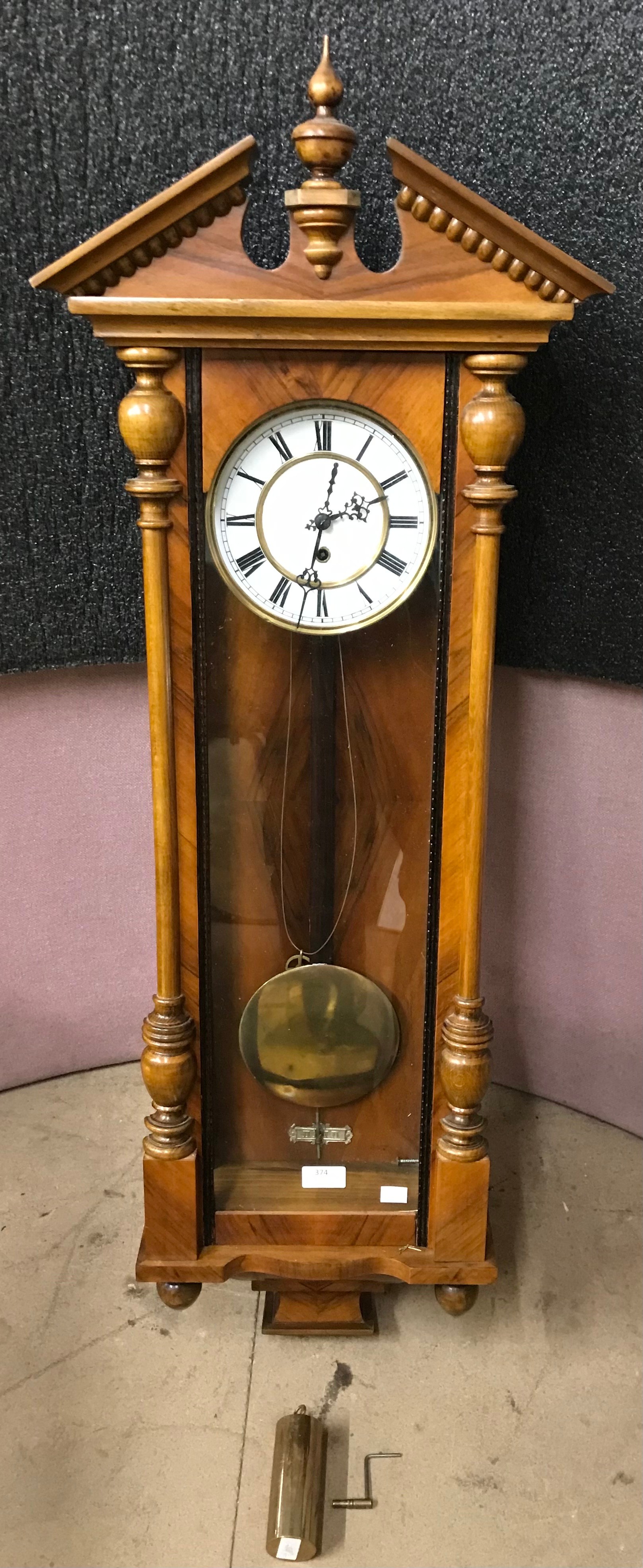 A 19th Century walnut wall clock