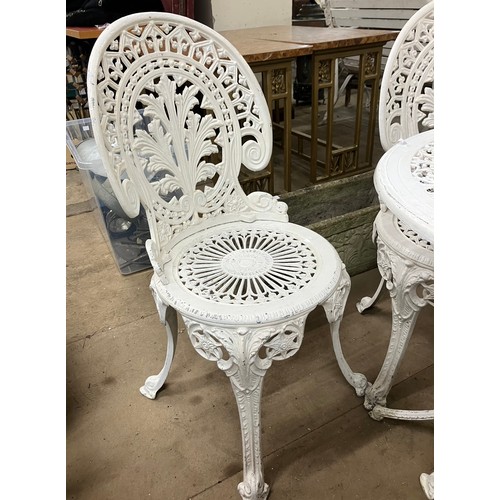 330 - A Victorian style painted cast iron patio set