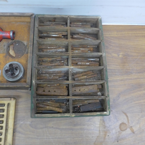 5027 - A large quantity of assorted taps and dies and a set of vintage milling bits