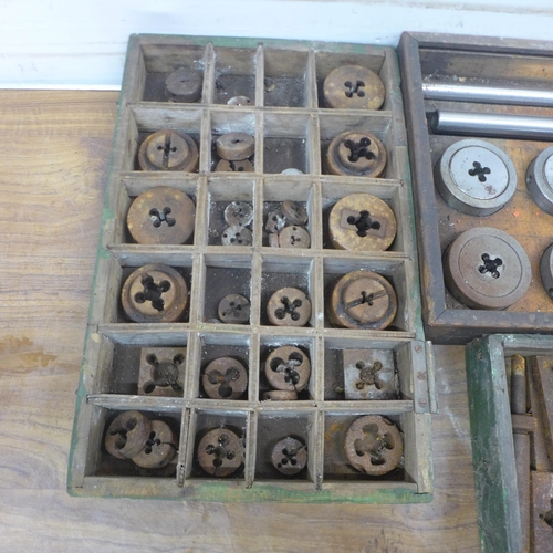 5027 - A large quantity of assorted taps and dies and a set of vintage milling bits