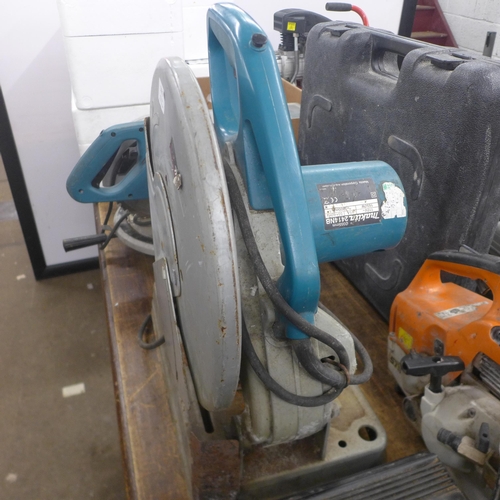 5031 - A Makita LS1040, 240V, 260mm chop saw and Makita 2414NB, 110V, 1650W electric cut-off saw