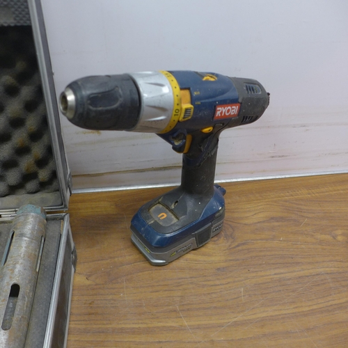 5053 - A set of Erbauer core cutting bits and a Ryobi GH1-1502 drill and charger