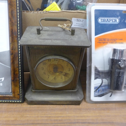 5057 - A quantity of assorted household items including cameras, vintage clock, binoculars, digital handhel... 