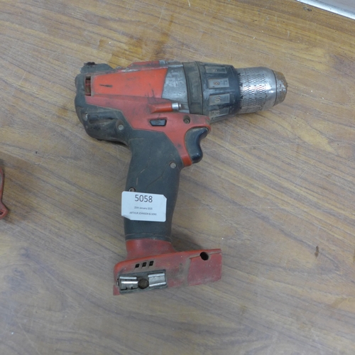 5058 - 2 Milwaukee power tools including a M18 hammer drill and a M12 multi tool