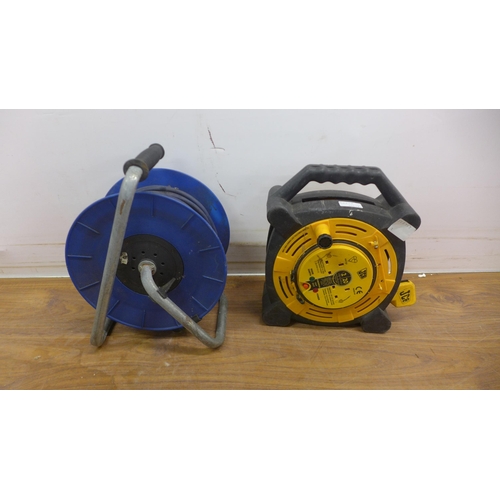 5062A - A JCB 2 socket, 20 metre extension cable reel and a Master Plug 4 socket, 40 metre extension cable r... 