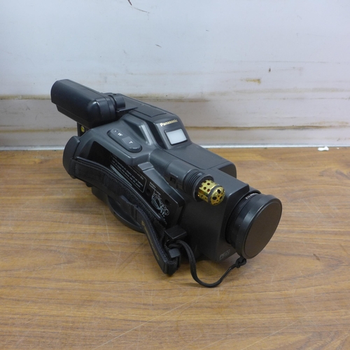 5065 - A Panasonic VM-SHMC20 VHS video camera in case and a Moza CCAK18CP gyroscopic mount