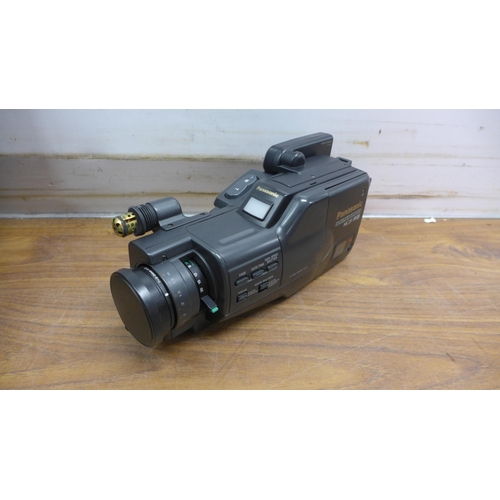 5065 - A Panasonic VM-SHMC20 VHS video camera in case and a Moza CCAK18CP gyroscopic mount