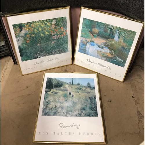 397 - Two Claude Monet gallery prints and one Renoir, framed