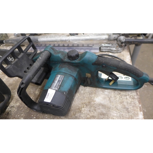 5184 - A Worx WG303E, 240V, 2000W electric chainsaw and a Makita UC3520A, 240V electric chainsaw