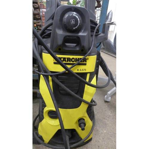 5207 - A Karcher K3.575 pressure washer with hose and lance and patio cleaner attachment