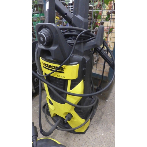 5207 - A Karcher K3.575 pressure washer with hose and lance and patio cleaner attachment