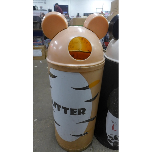 5222 - A set of plastic tiger and panda litter bins