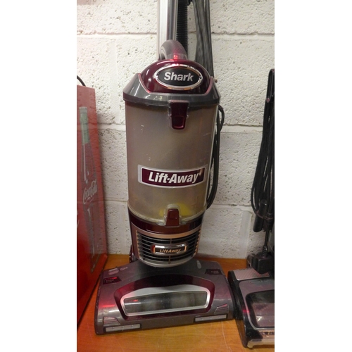 5128 - A Shark Lift-Away Duo Clean upright vacuum cleaner and one other Shark Lift-Away vacuum cleaner