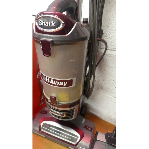 5128 - A Shark Lift-Away Duo Clean upright vacuum cleaner and one other Shark Lift-Away vacuum cleaner