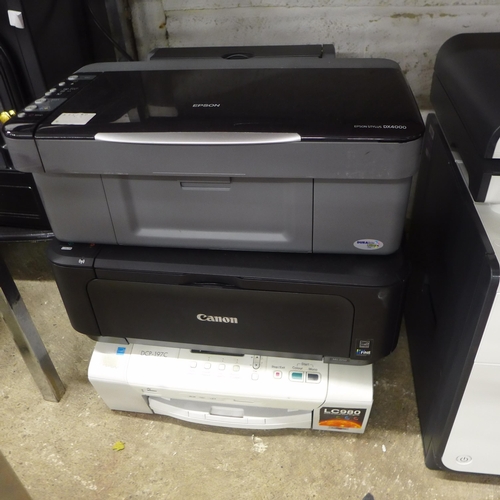 5130 - An Epson Stylus DX4000 MFD multi function printer, a Brother DCP-197C MFD multi function printer, a ... 