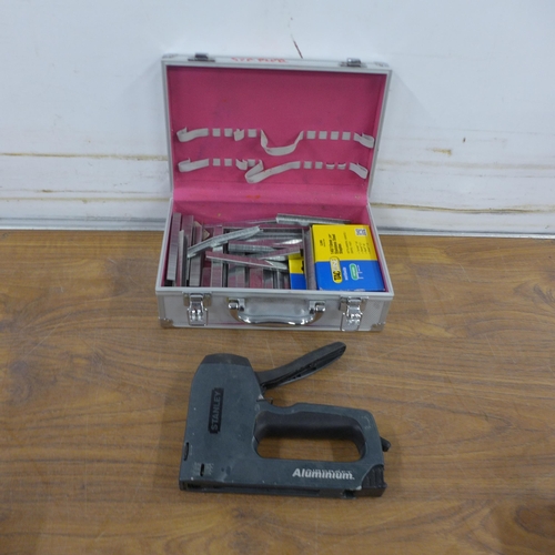 5330 - Four metal tool cases containing various tools including screwdrivers, a hammer, a saw, a Stanley st... 