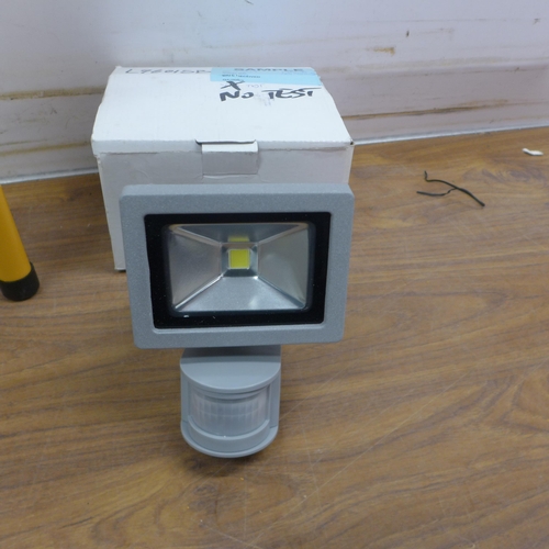 5348 - A boxed sample LED cob light with tripod stand* This lot is subject to VAT