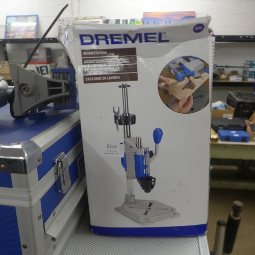 5313 - A quantity of Dremel tools and equipment including a Dremel multi-vise, a Dremel workstation, a Drem... 