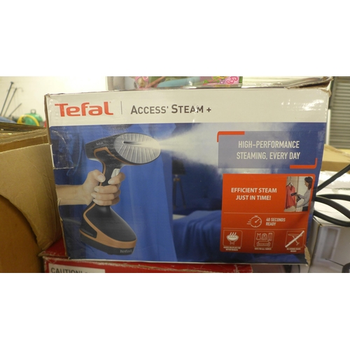 5287 - A Tefal Access steam and garment steamer, a My Doll and Horse set and an Argos Christmas skaters sce... 