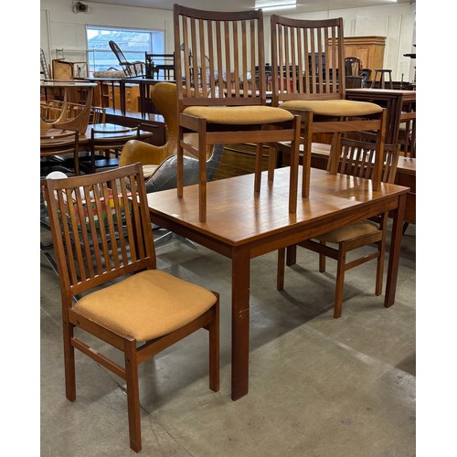 49 - A Danish Mogens Kold teak rectangular extending dining table and four chairs