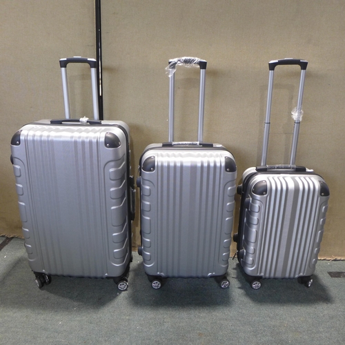 6025 - Three Piece Silver Suitcase Set, Large/Medium/Carry-on (349-62) *This lot is subject to VAT