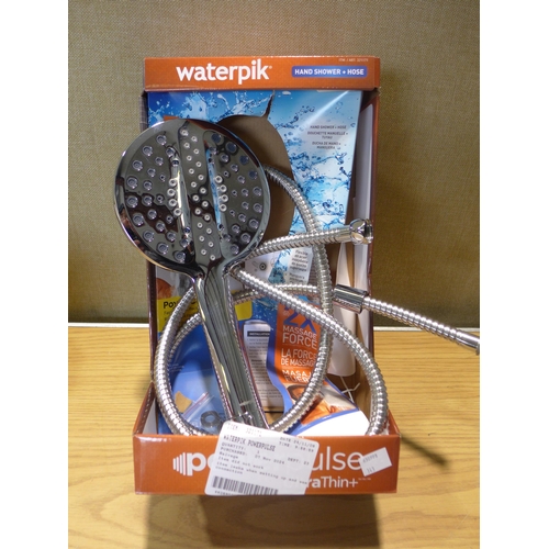 6040 - Waterpik Shower Head And Hose and Tork Paper Towel Rolls  (349-343,344) *This lot is subject to VAT