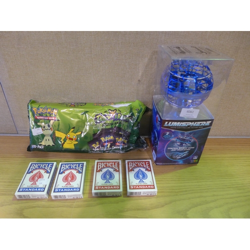 6061 - Four Packs of Bicycle Playing Cards, Hoverstar Flying Orb and Pokemon Trick or Trade Booster Bundle ... 