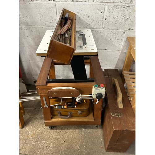 5169 - A carpenters tool box and tools, four Magnusson cramps, a Charnwood wood router table and case