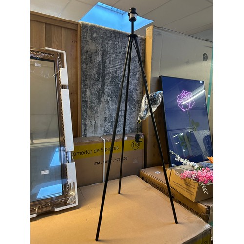 3243 - A black tripod floor lamp (no shade)