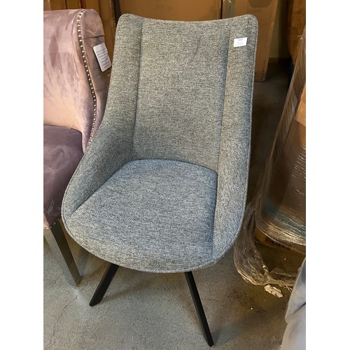 3307 - A light grey swivel dining chair *This lot is subject to VAT