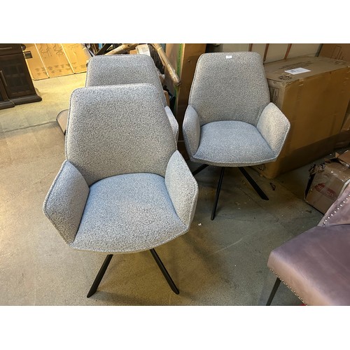 3312 - A set of three grey boucle dining chairs *This lot is subject to VAT