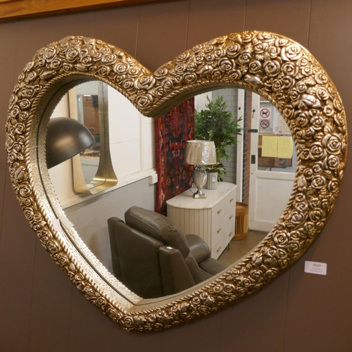 3080 - A rose heart shaped mirror