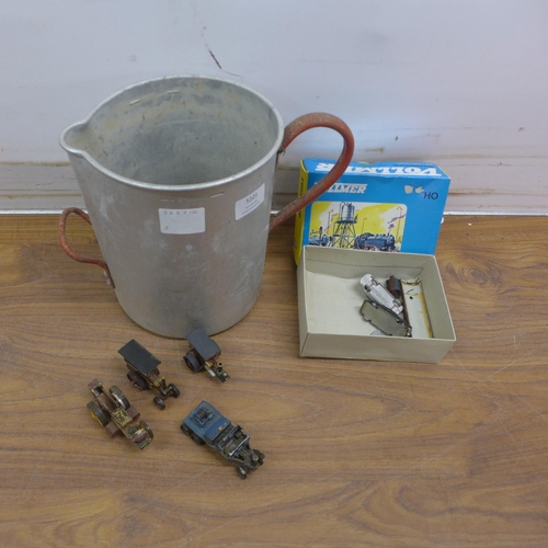 5126 - A stainless steel water jug and a quantity of die-cast model toys including vehicles such as cars, t... 