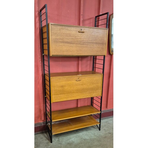 3 - A Staples teak and black metal Ladderax room divider, designed by Robert Heal