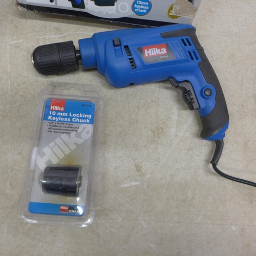 5070 - A selection of power tools including a Hilka 600W hammer drill, a Draper 880W PT9115 angle grinder a... 