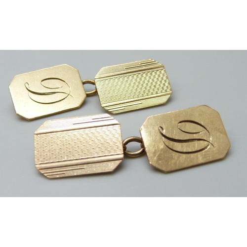 7003 - A pair of 9ct gold engraved design cufflinks with initial, 6.1g