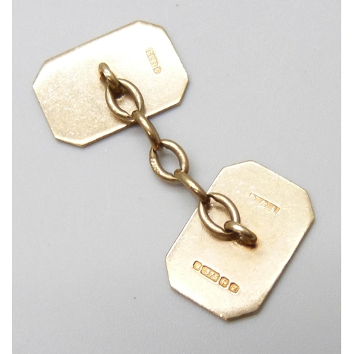 7003 - A pair of 9ct gold engraved design cufflinks with initial, 6.1g