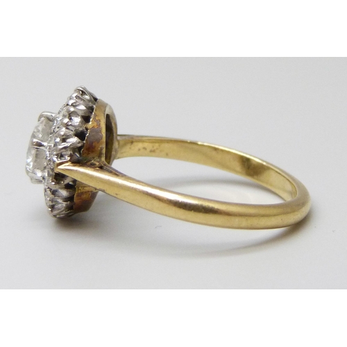 7006 - An 18ct gold and diamond ring, central diamond approximately 0.75ct, 4.2g, P