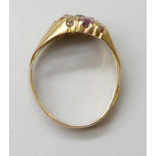 7007 - An 18ct gold ring set with ruby, sapphire and diamonds, 4.2g, K