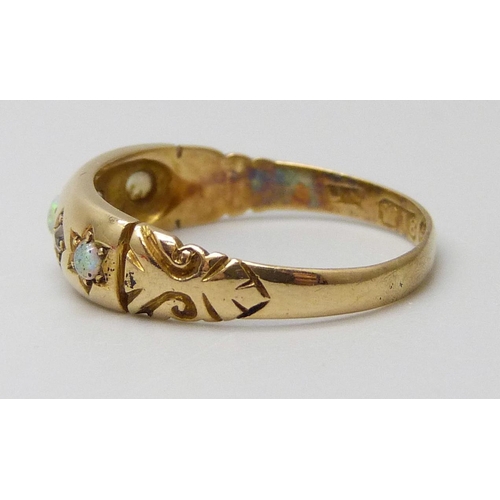 7012 - A Victorian 18ct gold, opal and diamond ring, Birmingham 1897, 2.6g, N