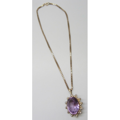 7030 - An amethyst and half seed pearl pendant, 3.4cm, stone  1.8 x 2.3cm, together with a 9ct gold chain, ... 