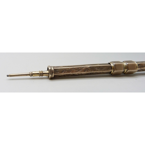 7033 - A Victorian propelling dip pen / pencil set with an intaglio seal, 10.2cm