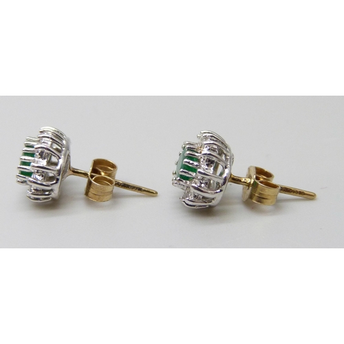 7037F - A pair of hallmarked 9ct gold, diamond and emerald cluster earrings, 1.6g, 8mm